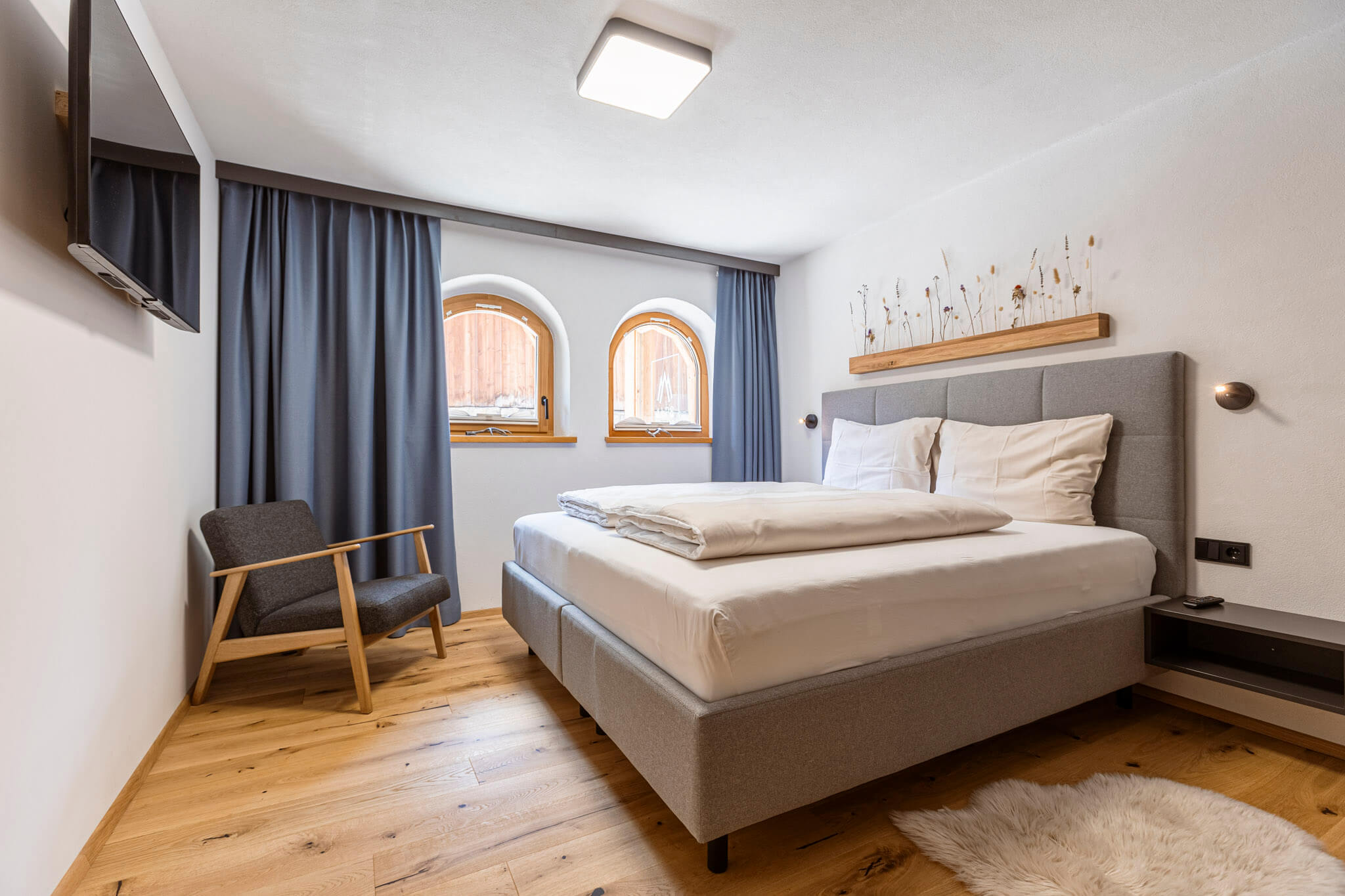 Schlafzimmer - Zugspitz Suites Lermoos Schlafzimmer - Zugspitz Suites Lermoos