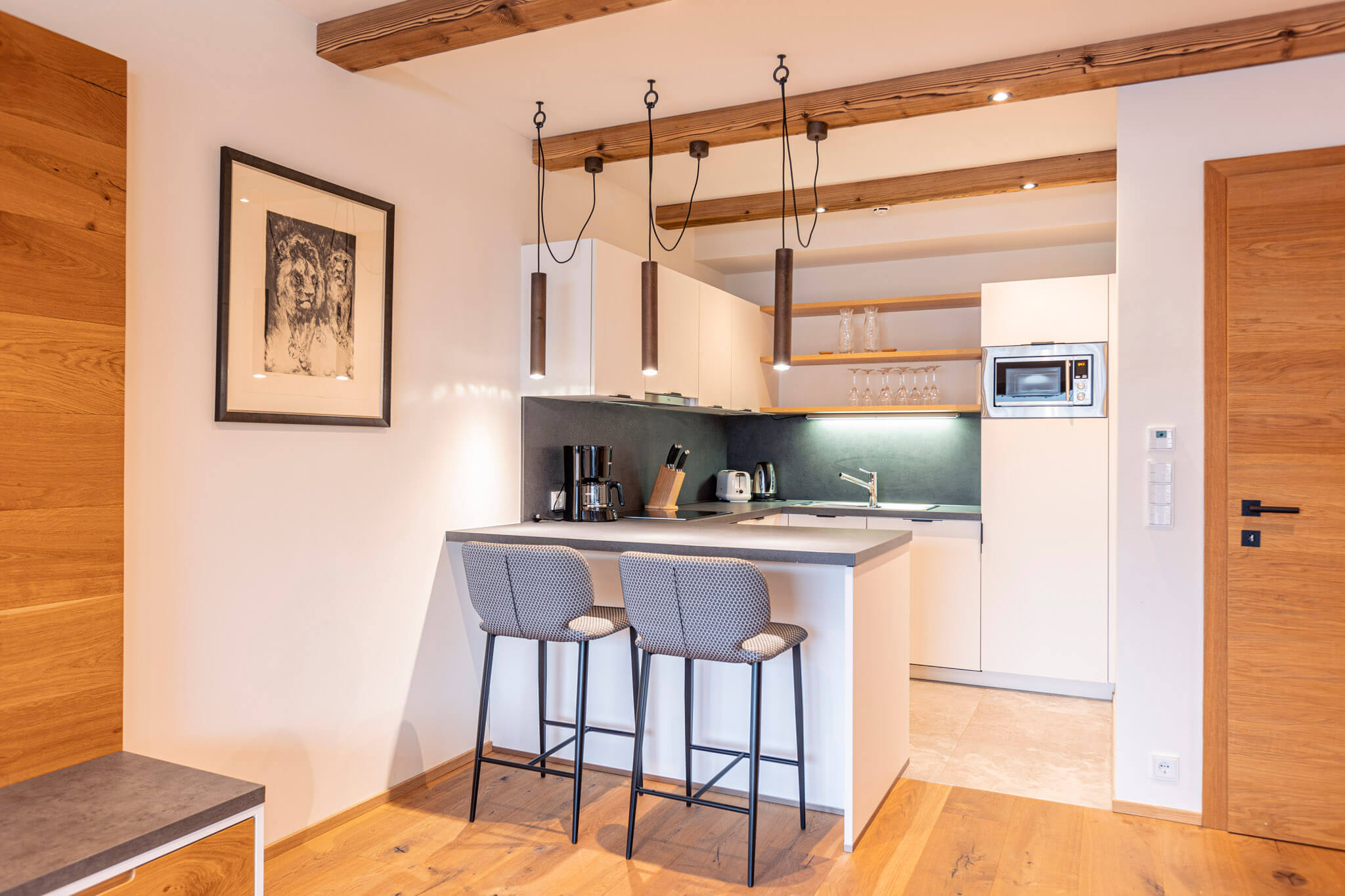 Essbereich und Küche Chalet Streif - Dorfresort Kitzbühel Essbereich und Küche Chalet Streif - Dorfresort Kitzbühel